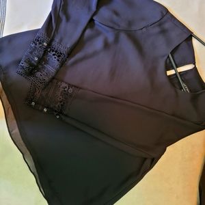 Black women's bell sleeve lace detail top! Size medium